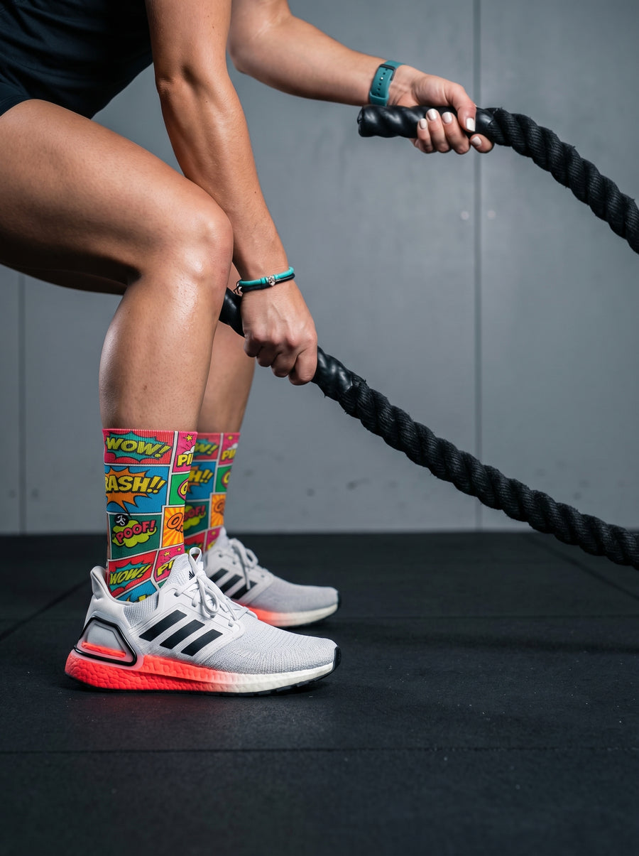 girl doing crossfit rope with comic socks